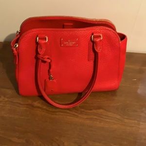 Red leather handbag
